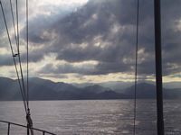 Sunrays highlighting the cascading hills of South Banderas Bay